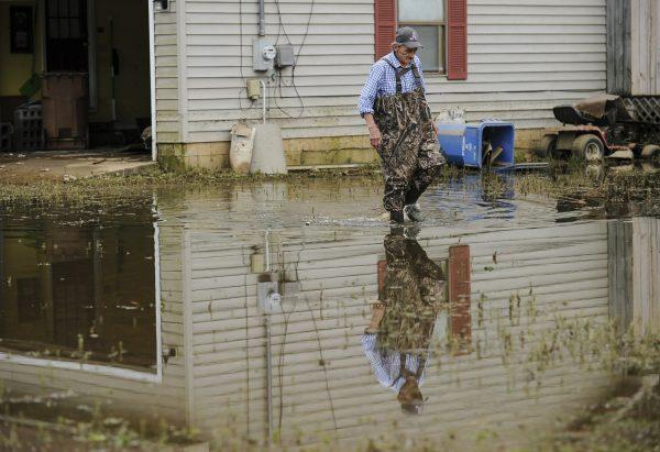 Kenny Thomas walks outside his home in Hartselle, Ala. on Feb. 26, 2019. (Jeronimo Nisa/The Decatur Daily via AP)