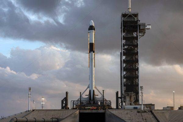 The SpaceX Falcon 9 rocket and Crew Dragon spacecraft is rolled out to Launch Complex 39A for a dry run to prep for the upcoming Demo-1 flight test at NASA's Kennedy Space Center in Florida, on Jan. 3, 2019. (SpaceX via AP)