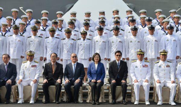 Taiwan's President Tsai Ing-wen (center) and assembled naval personnel take part in a ceremony to commission two Perry-class guided missile frigates from the United States into the Taiwan Navy, in the southern port of Kaohsiung on Nov. 8, 2018. (Chris Stowers/AFP/Getty Images)