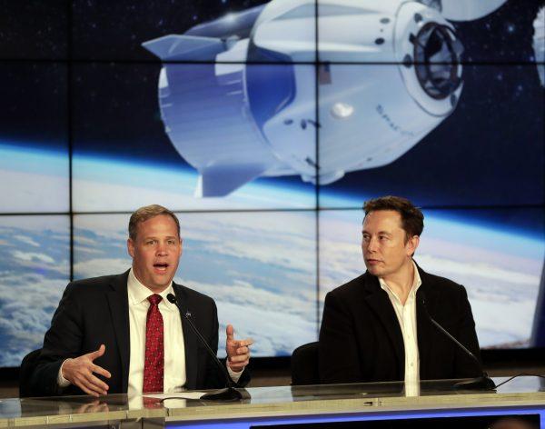 NASA Administrator Jim Bridenstine, left, and Elon Musk, CEO of SpaceX, answer questions during a news conference after the SpaceX Falcon 9 Demo-1 launch at the Kennedy Space Center in Cape Canaveral, Fla., on March 2, 2019. (John Raoux/AP)