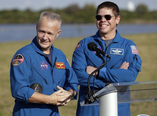 NASA astronauts Doug Hurley, left, and Bob Behnken answer questions during a news conference before the Falcon 9 SpaceX Crew Demo-1 rocket launch at the Kennedy Space Center in Cape Canaveral, Fla., on March 1, 2019. (John Raoux/AP)
