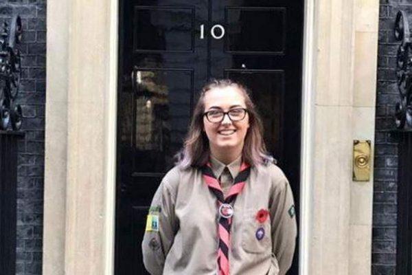 Stabbing victim Jodie Chesney posing wearing a Girl Scouts' uniform outside 10 Downing Street in London. (Facebook)