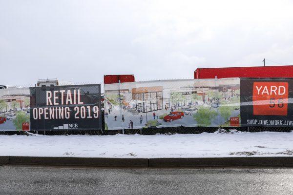 Sign for a development project in an opportunity zone in Baltimore on Feb. 3, 2019. (Emel Akan/The Epoch Times)