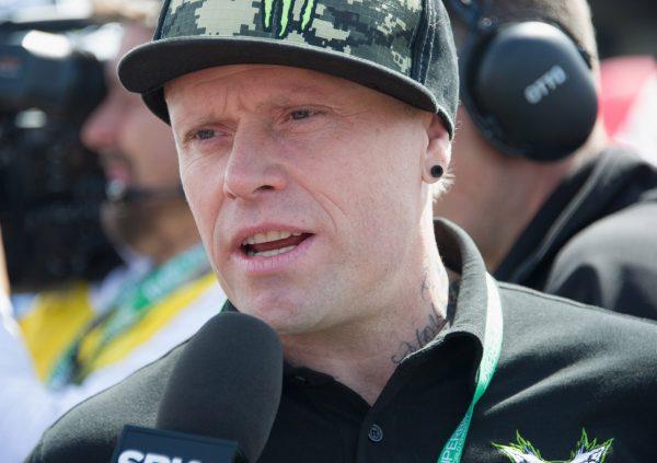 Musician Keith Flint speaks with journalists on the grid during the race 1 of the World Superbikes - Race during the round five of 2013 Superbikes FIM World Championship at Donington Park in Castle Donington, England on May 26, 2013. (Mirco Lazzari gp/Getty Images)