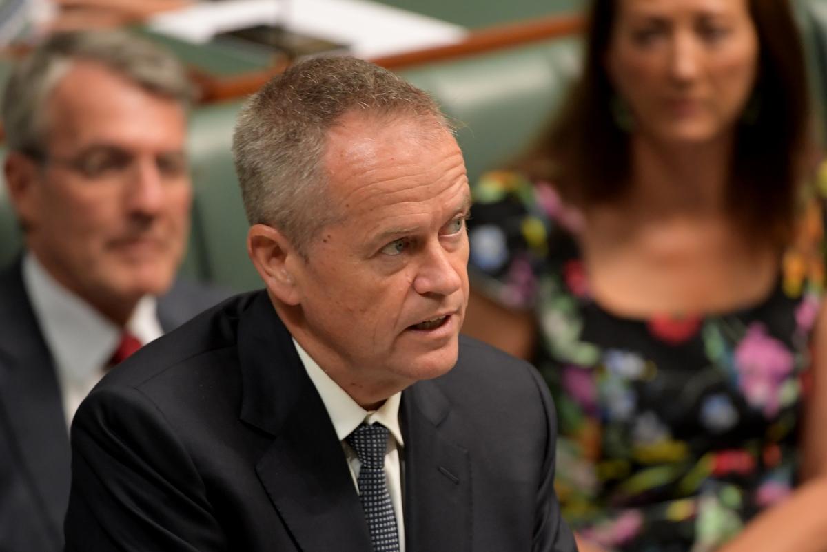 Opposition leader Bill Shorten responds to Prime Minister Scott Morrison after he announced to the parliament that the Liberal party, Nationals party and the Labor party were all recently hacked at Parliament House in Canberra, Australia on Feb. 18, 2019. (Tracey Nearmy/Getty Images)