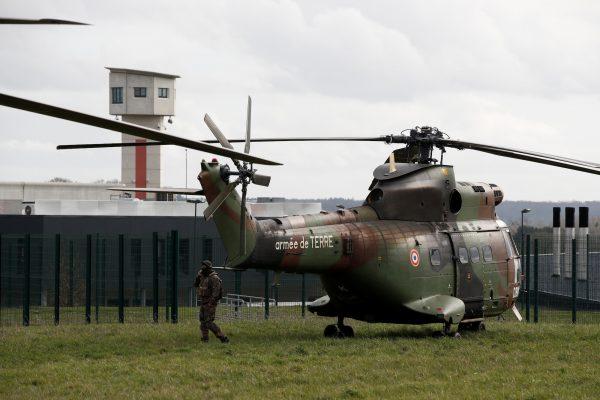 A French Army helicopter is seen outside the prison where an inmate in one of France's most secure prisons stabbed two guards with a knife in Condé-sur-Sarthe, France, March 5, 2019. (Benoit Tessier/Reuters)