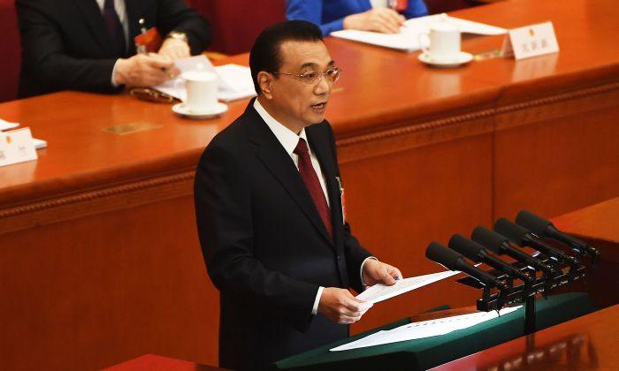 Chinese Regime Unlikely to Truly Reduce Taxes as Promised, Experts Say