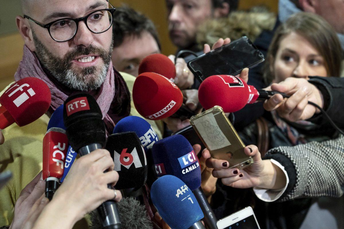 Francois Devaux, the president of the association "La Parole Liberee" (Lift the Burden of Silence), a group of victims, answers reporters at the Lyon courthouse, central France, on March 7, 2019. (Laurent Cipriani/AP Photo)