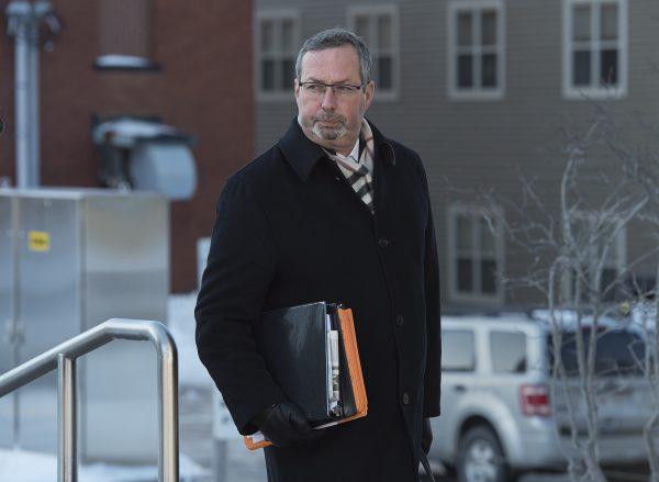 Michael Lacy, a member of Dennis Oland's defence team, heads to the Law Courts in Saint John, N.B., on March 7, 2019. (Andrew Vaughan/The Canadian Press)