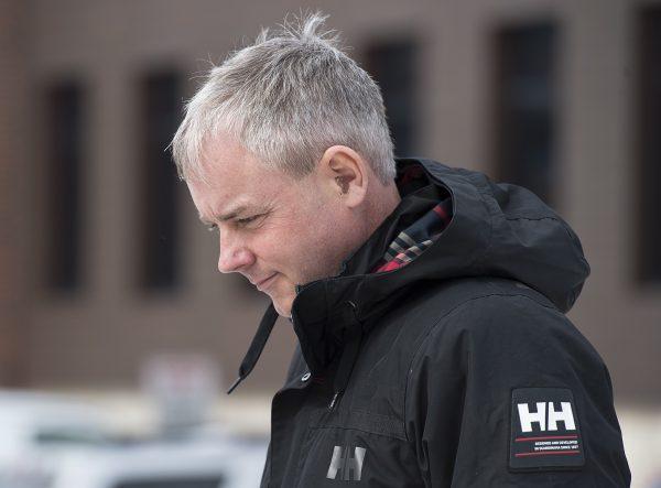 Dennis Oland heads from the Law Courts as he continues his testimony in Saint John, N.B., on March 7, 2019. (Andrew Vaughan/The Canadian Press)