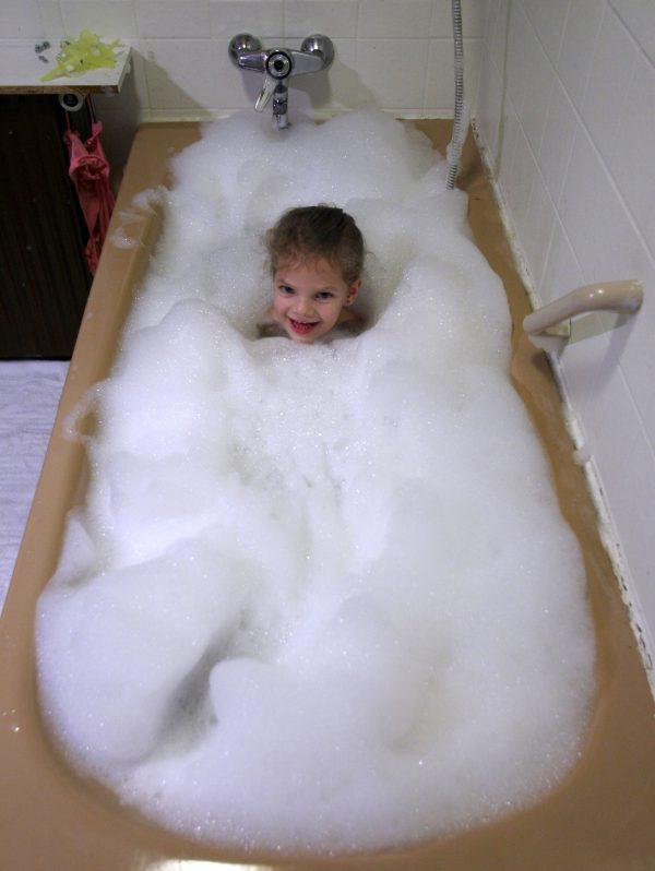 A child enjoys a bubble bath on Jan. 13, 2007, in Hamburg, Germany. (Alexander Hassenstein/Getty Images)
