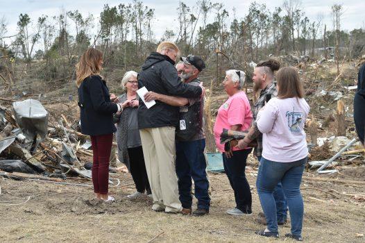 President Donald Trump greets residents during a tour of tornado-affected areas in Beauregard, Alabama, on March 8, 2019. (Nicholas Kamm/AFP/Getty Images)
