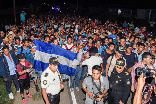  A caravan of mainly Honduran migrants, heading to the United States, arrives in Chiquimula, Guatemala, on Oct. 22, 2018. (Orlando Estrada/AFP/Getty Images)