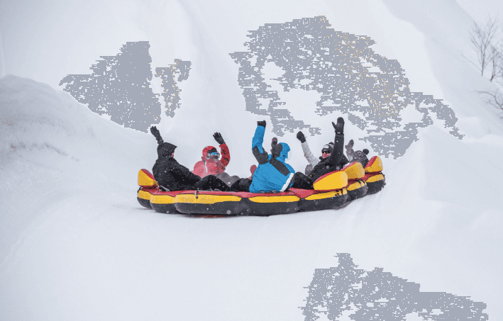Riders in tubing raft. (Jimmy Vigneux/Tubing Hill)