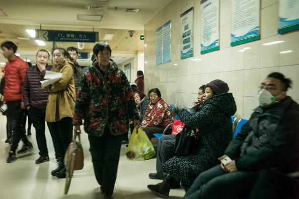 Patients wait in a hospital in Baoding City, Hebei Province, China on Dec. 13, 2017. (Fred Dufour/AFP/Getty Images)