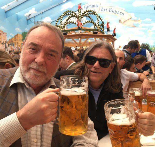The authors Ian Tattersall (L) and Rob DeSalle conducting rigorous research at Oktoberfest. (Courtesy of Rob DeSalle and Ian Tattersall)