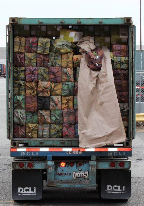 A truck containing 3,200 pounds of cocaine in 60 packages, where it was seized at the Port of New York/Newark, in Newark, N.J., on Feb. 28, 2019. (U.S. Customs and Border Protection via AP)