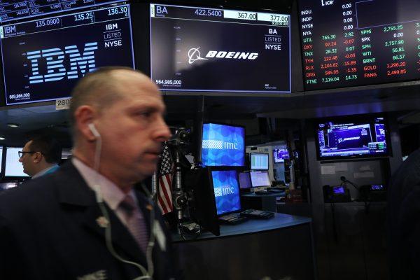 A Boeing stock sign is displayed on a screen on the floor of the New York Stock Exchange on March 11, 2019. (Spencer Platt/Getty Images)