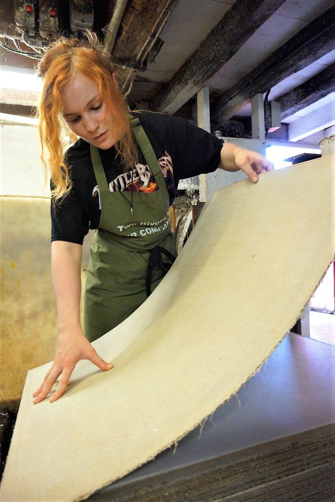 Apprentice Zoe Collis is learning the trade of commercial papermaking at Two Rivers Paper in Somerset, England. Commercial papermaking is a critically endangered craft. (Alison Jane Hoare)