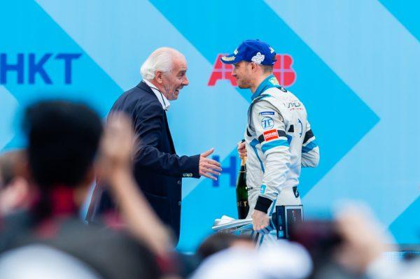 Was Mortara being told of a possible change of fortune as he stepped off the podium holding second place? (Christopher Wong/Sports Action HK)