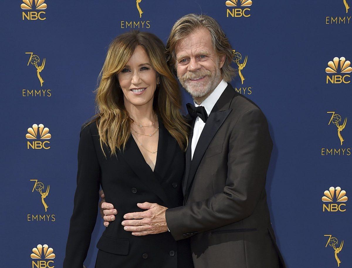 Felicity Huffman, left, and William H. Macy arrive at the 70th Primetime Emmy Awards in Los Angeles on Sept. 17, 2018. (Jordan Strauss/Invision/AP)