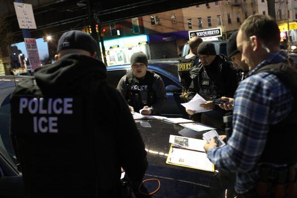 Immigration and Customs Enforcement officers prepare for an operation to arrest illegal immigrants in New York City, on April 11, 2018. (John Moore/Getty Images)