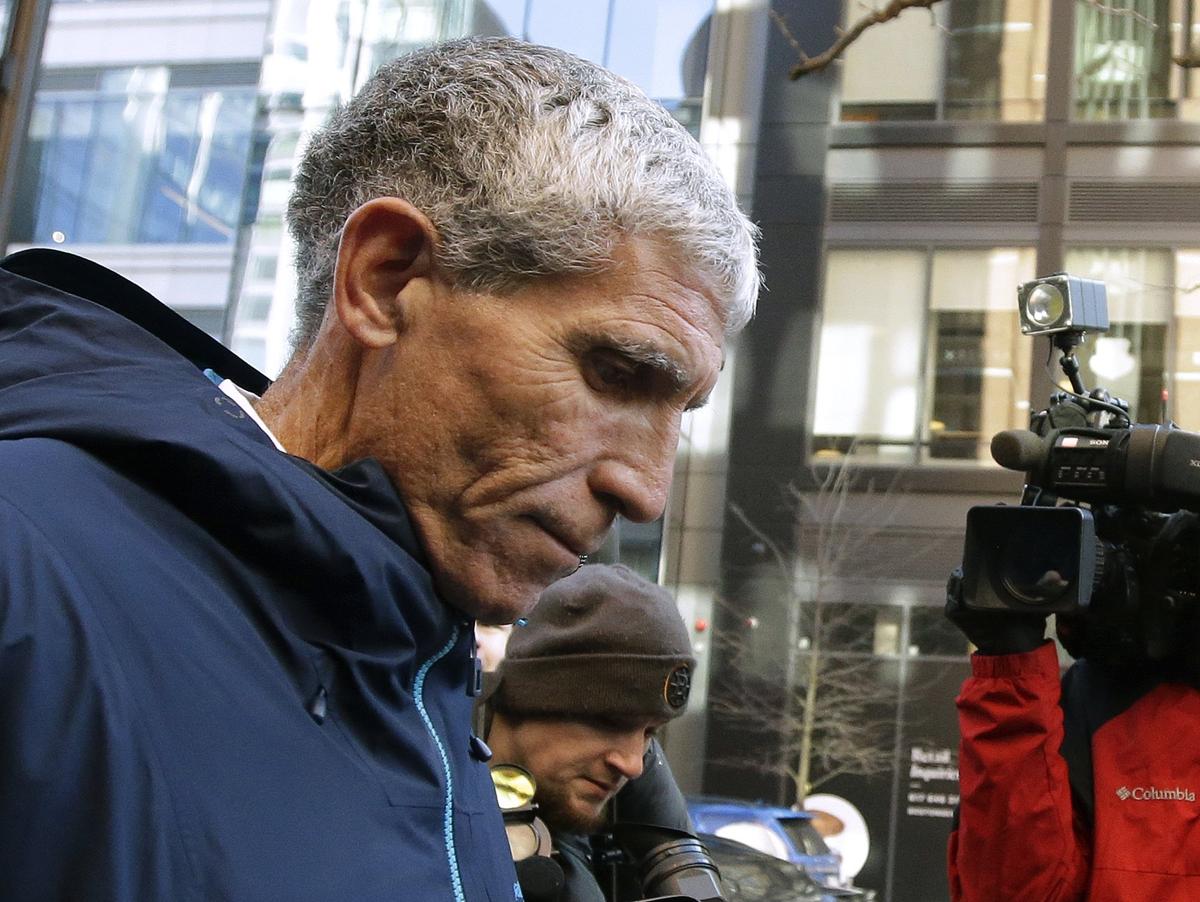 William "Rick" Singer founder of the Edge College & Career Network, departs federal court after pleading guilty to charges in a nationwide college admissions bribery scandal in Boston, Mass., on March 12, 2019. (Steven Senne/AP Photo)