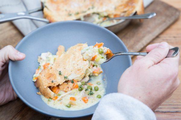 Dish the pot pie into two shallow bowls and enjoy. (Caroline Chambers)
