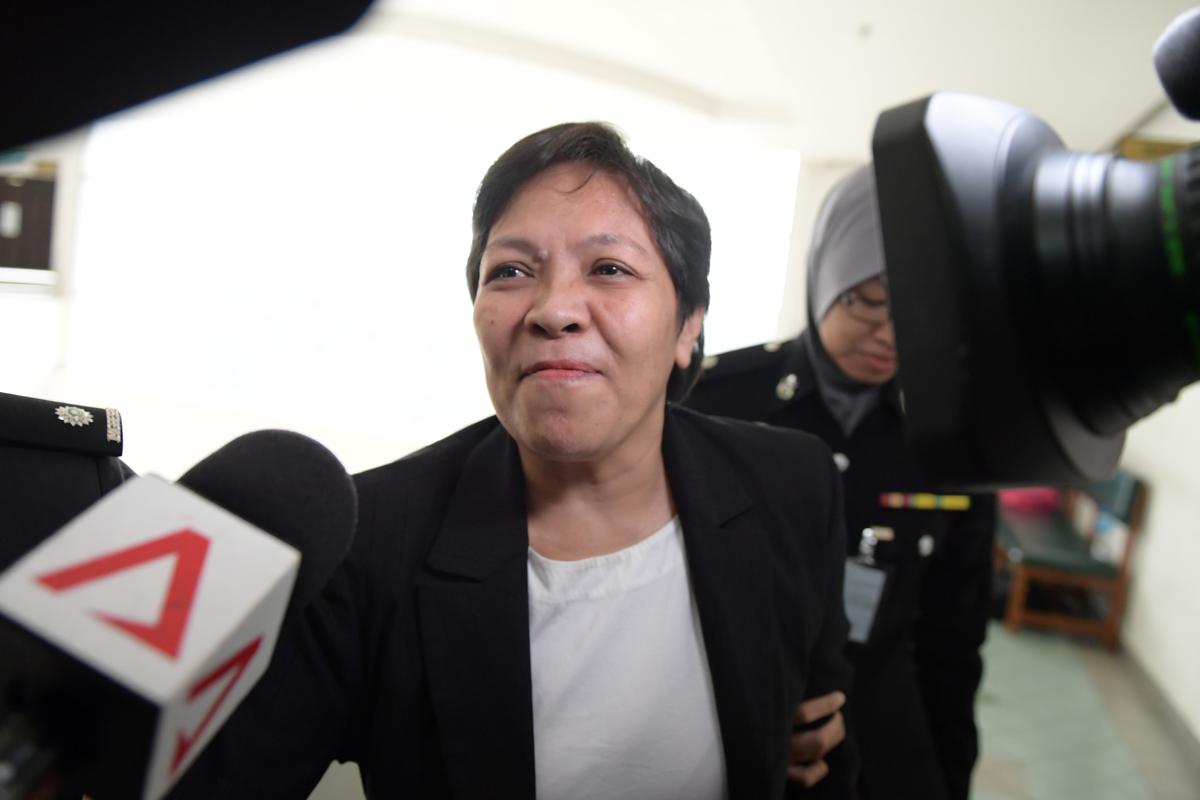 Maria Elvira Pinto Exposto reacts after she was cleared of drug trafficking charges at Shah Alam High Court in Shah Alam, outside Kuala Lumpur, on Dec. 27, 2017.<br/>(Mohd Rasfan/AFP/Getty Images)