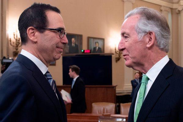 US Treasury Secretary Steven Mnuchin (L) speaks with Chairman of the House Ways and Means Committee, Richard Neal, prior to testifying on "The President's FY2020 Budget Proposal" before the House Ways and Means Committee on Capitol Hill in Washington, DC, on March 14, 2019. (JIM WATSON/AFP/Getty Images)