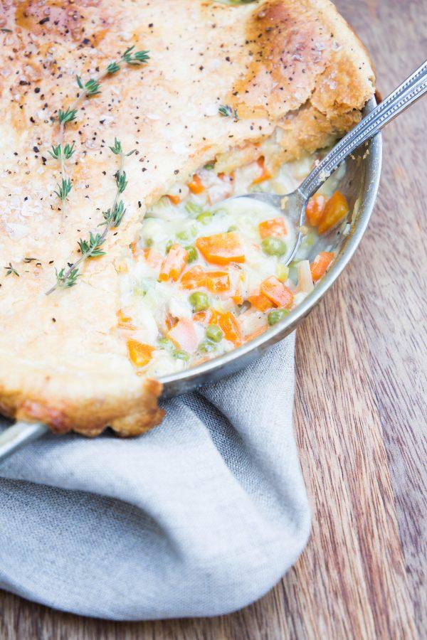 This chicken pot pie relies on the last of winter’s delicate, garlicky leeks and a generous portion of Parmesan for its creamy base. (Caroline Chambers)