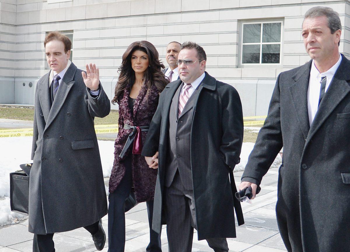 Teresa Giudice (L) and Joe Giudice leave court after facing charges fraud during a bankruptcy case in Newark, N.J., on March 4, 2014. (Mike Coppola/Getty Images)