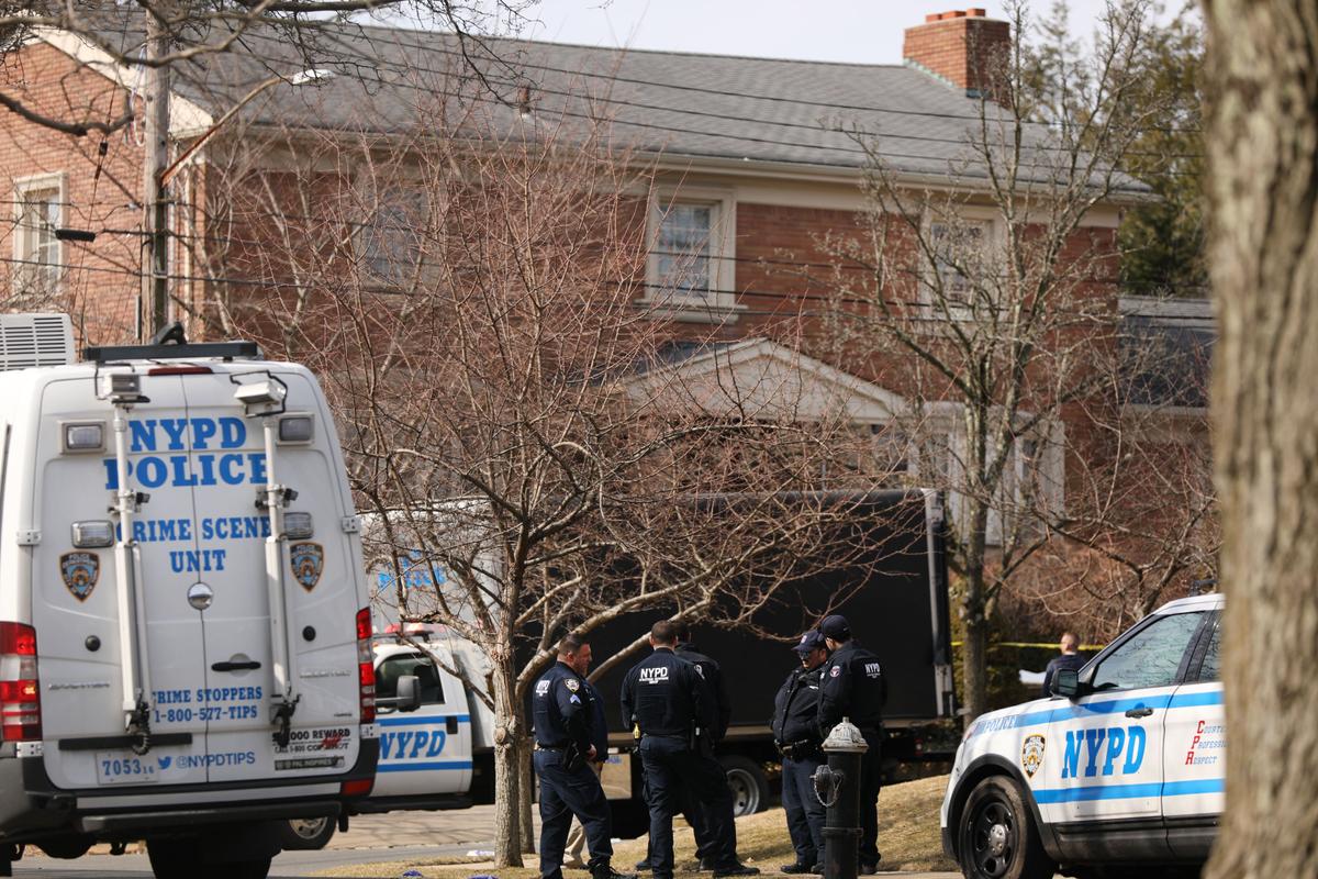 Police stand near where reputed mob boss Francesco “Franky Boy” Cali lived and was gunned down on March 14, 2019, in the Todt Hill neighborhood of the Staten Island borough of New York City. (Spencer Platt/Getty Images)
