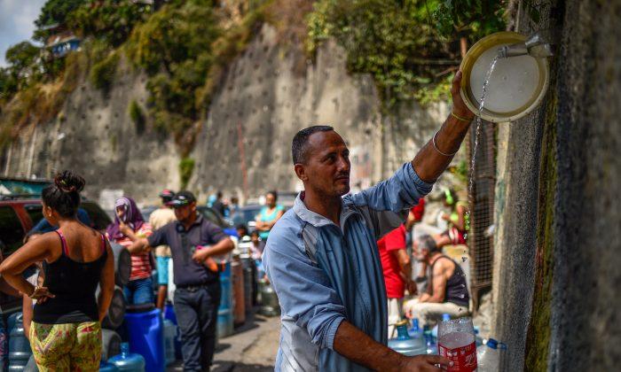 Power Restored in Venezuela but Daily Struggle Continues