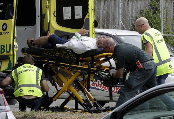 Ambulance staff take a man from outside a mosque in central Christchurch, New Zealand, on March 15, 2019. (Mark Baker/AP Photo)