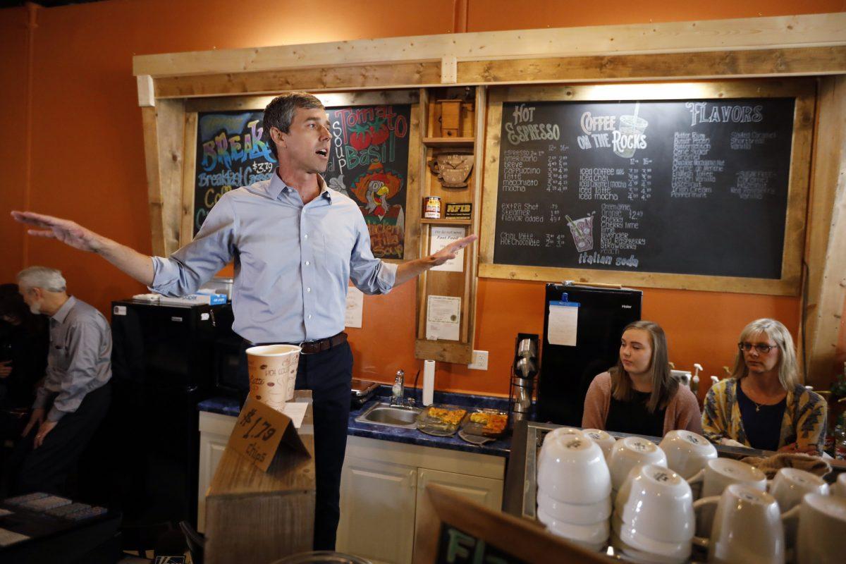 Former Texas congressman Beto O’Rourke speaks to local residents during a stop at the Central Park Coffee Company, Friday, March 15, 2019, in Mount Pleasant, Iowa. (AP Photo/Charlie Neibergall)