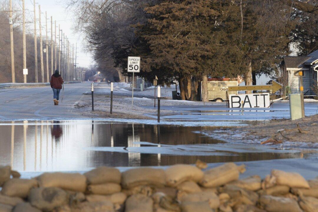 Floodwaters Breach Levees Prompting Rescues, Evacuations Across Midwest