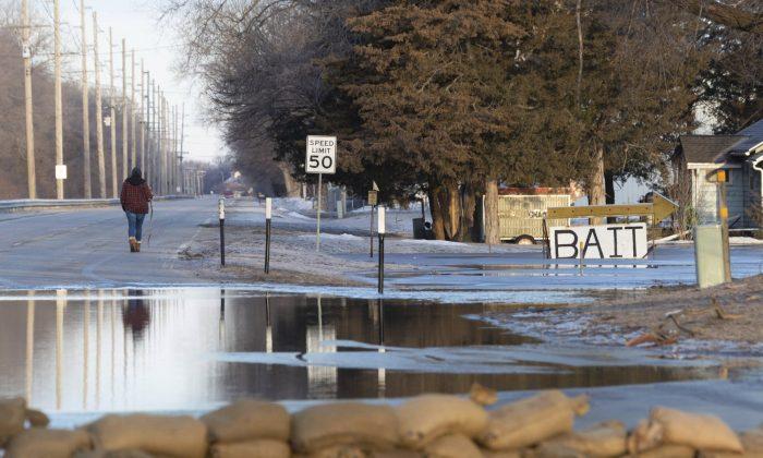 Floodwaters Breach Levees Prompting Rescues, Evacuations Across Midwest