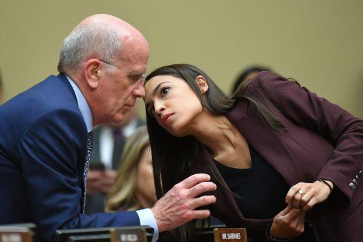 Rep. Alexandria Ocasio-Cortez(D-N.Y.) speaks with Rep. Michael Welch(D-Vt.) on Capitol Hill in Washington, on Feb. 27, 2019. (Mandel Ngan/AFP/Getty Images)