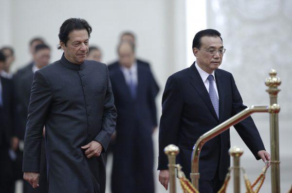 Pakistani Prime Minister Imran Khan and China's Premier Li Keqiang attend a welcome ceremony at the Great Hall of the People in Beijing on November 3, 2018. (Jason Lee/AFP/Getty Images)
