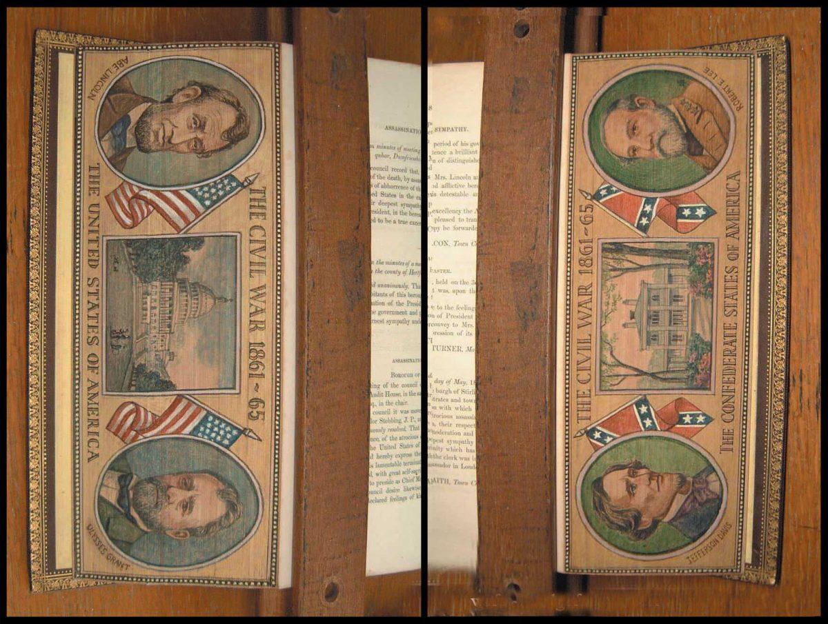 A press holds open “The Assassination of Abraham Lincoln: A Tribute of the Nations,” published in 1867. This is an example of split-double fore-edge paintings, where a larger book is split in two and painted. (Foredgefrost)