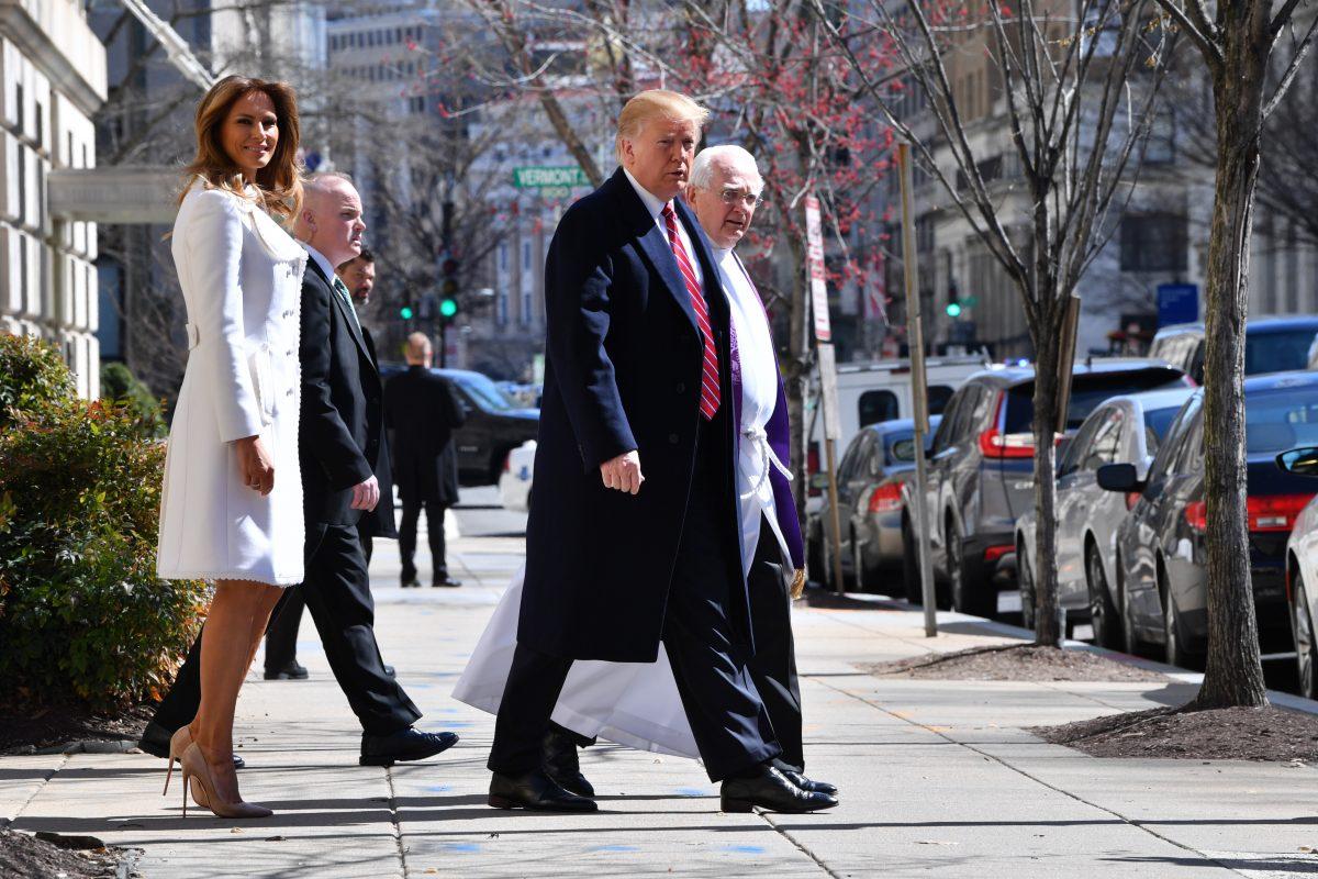 President Donald Trump and First Lady Melania Trump (L) with interim rector Bruce McPherson (R) as they leave St. Johns Episcopal church in Washington, on March 17, 2019. (Nicholas Kamm/AFP/Getty Images)