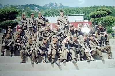 An undated photo shows South Korean training for missions to the North posing for a group photo. (Republic of Korea Special Mission's Exploits Association)