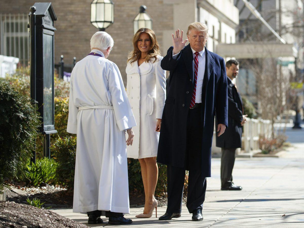 President Donald Trump with first lady Melania Trump, and Reverend Bruce McPherson, waves to media as he arrives to attend service at Saint John's Church in Washington, on March 17, 2019 (Carolyn Kaster/AP Photo)