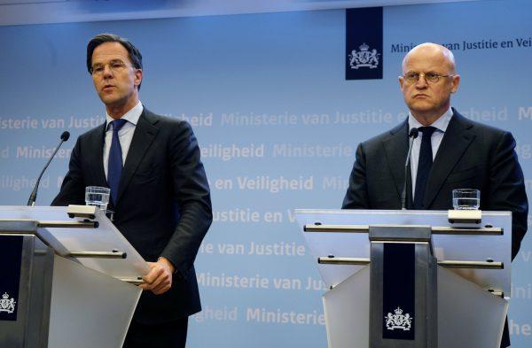 Dutch Prime Minister Mark Rutte, left, and Justice and Security Minister Ferd Grapperhaus speak to the media at a press conference in The Hague, Netherlands, on March 18, 2019. (Michael Corder/AP Photo)