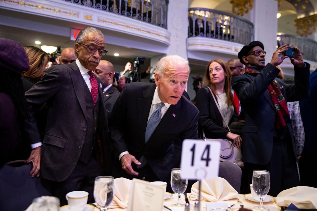 Rev. Al Sharpton and former Vice President Joe Biden arrive during the National Action Network Breakfast on January 21, 2019 in Washington. (Al Drago/Getty Images)