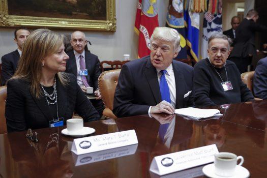 President Donald Trump meets with CEO of General Motors Mary Barra (L), CEO of Fiat Chrysler Automobiles Sergio Marchionne (R), and other auto industry leaders in the Roosevelt Room of the White House on Jan. 24, 2017. (Shawn Thew-Pool/Getty Images)