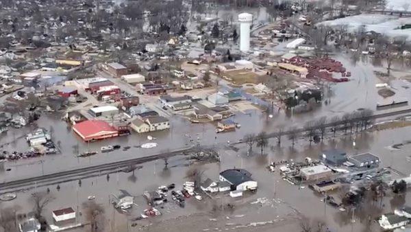 An aerial view of damaged buildings after a storm triggered historic flooding, in Valley, Nebraska, in this still image from a handout video taken March 16, 2019. (Office of Governor Pete Ricketts/Reuters)
