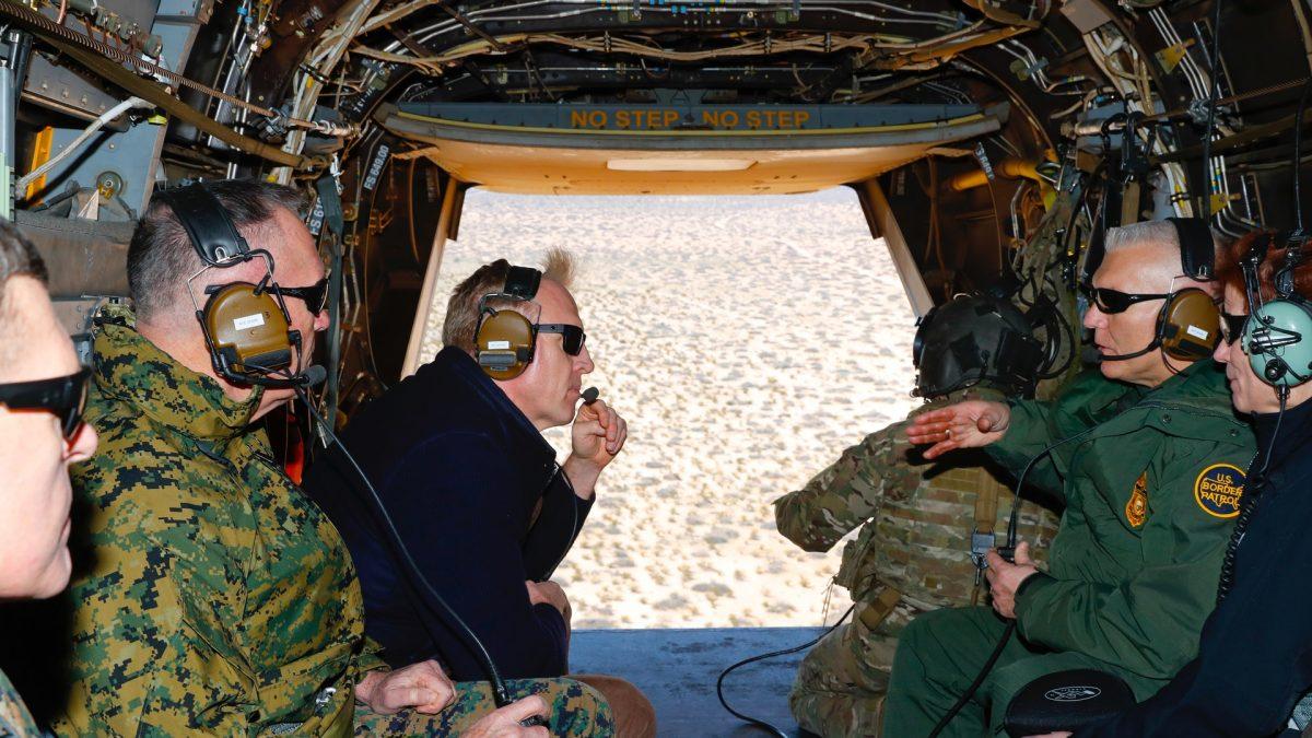 Acting Secretary of Defense Patrick Shanahan, center, Joint Chiefs Chairman Gen. Joseph Dunford left, and El Paso Sector Chief Aaron Hull, right, aboard a helicopter tour of the US-Mexico border area west of El Paso, Texas on Feb. 23, 2019. (Pablo Martinez Monsivais - Pool /Getty Images)
