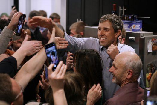 Democratic presidential candidate Robert "Beto" O'Rourke shakes hands as he arrives at a packed St. Patrick's Day party at the home of County Recorder John Murphy in Dubuque, Iowa, on March 16, 2019. (Chip Somodevilla/Getty Images)